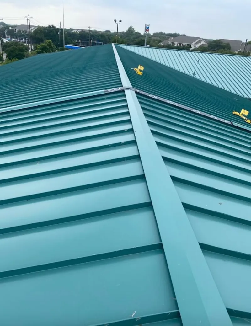 Green commercial metal roof ridge and valley for Metal Roof Repair in Longmeadow